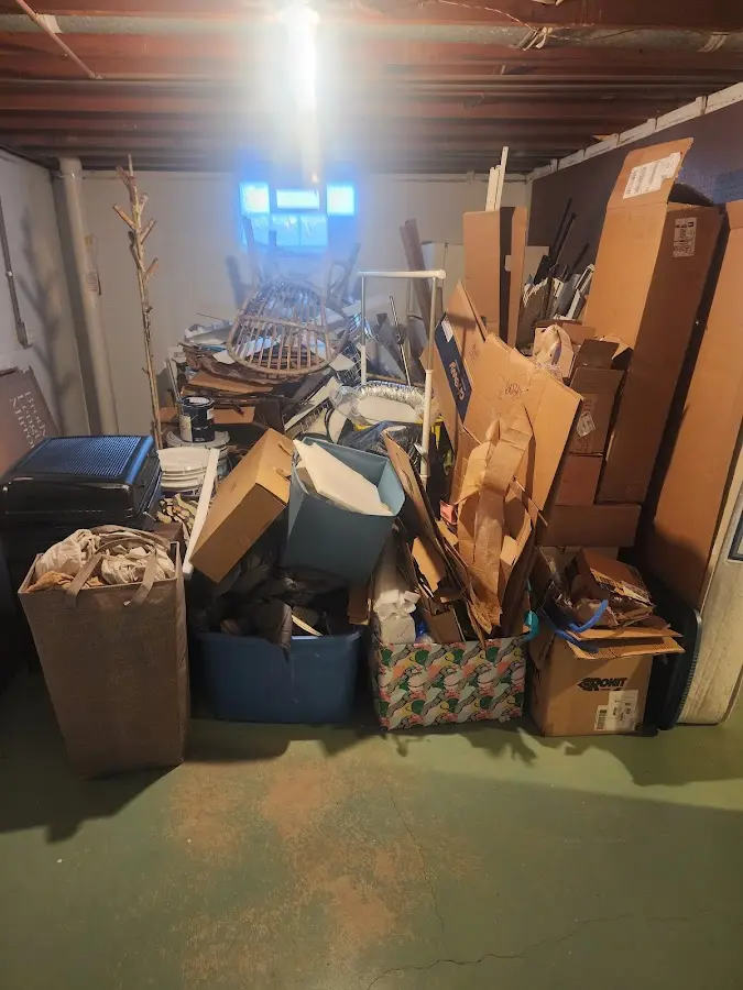 Roll-off dumpster container at job site for Concrete Dumpster Rental in Prairie Heights